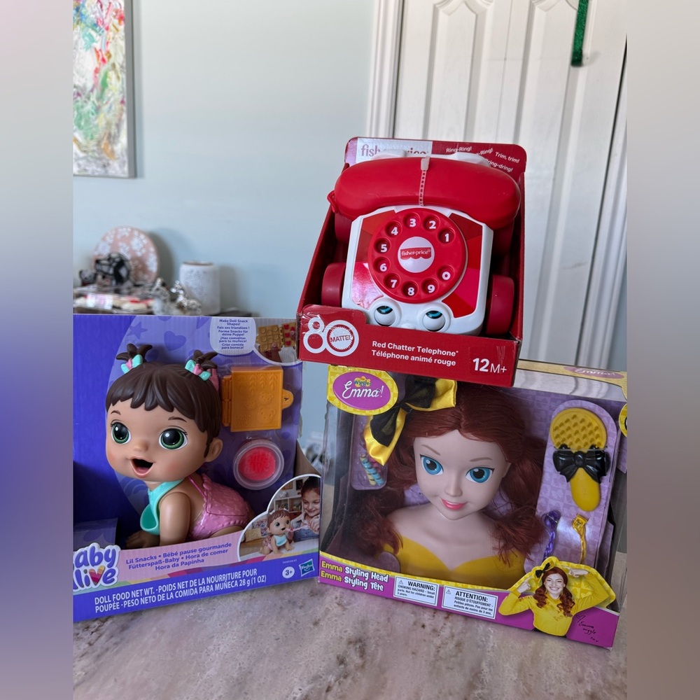Fisher-Price phone, Wiggles Emma Doll head and Baby Alive Doll